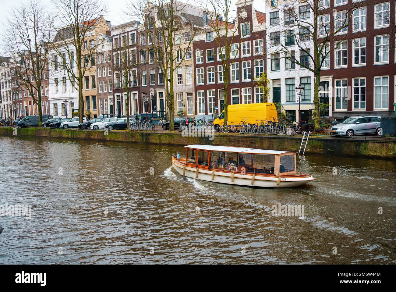 Channel in Amsterdam Netherlands houses river Amstel landmark old european city landscape Stock Photo