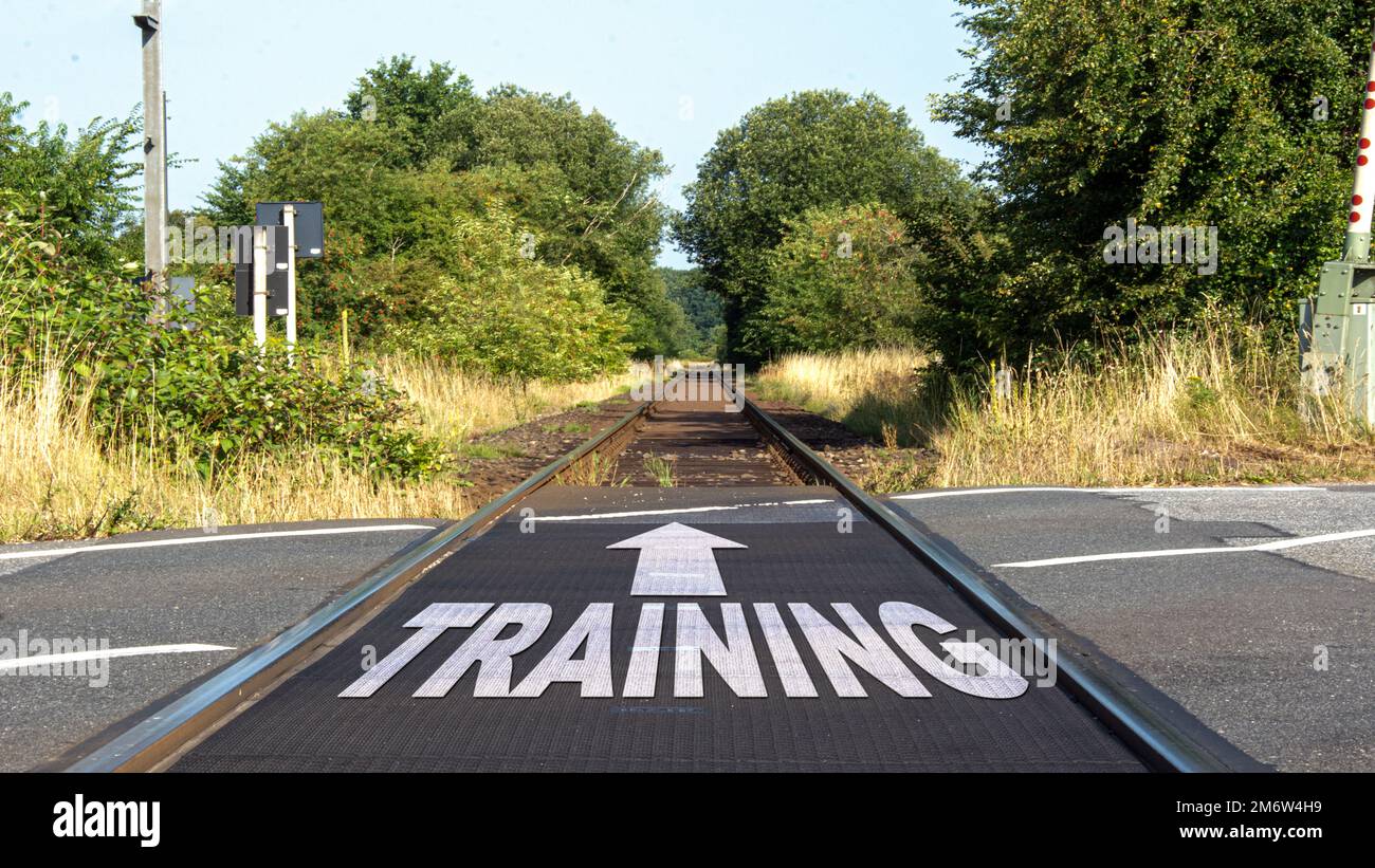 Street Sign to Training Stock Photo - Alamy