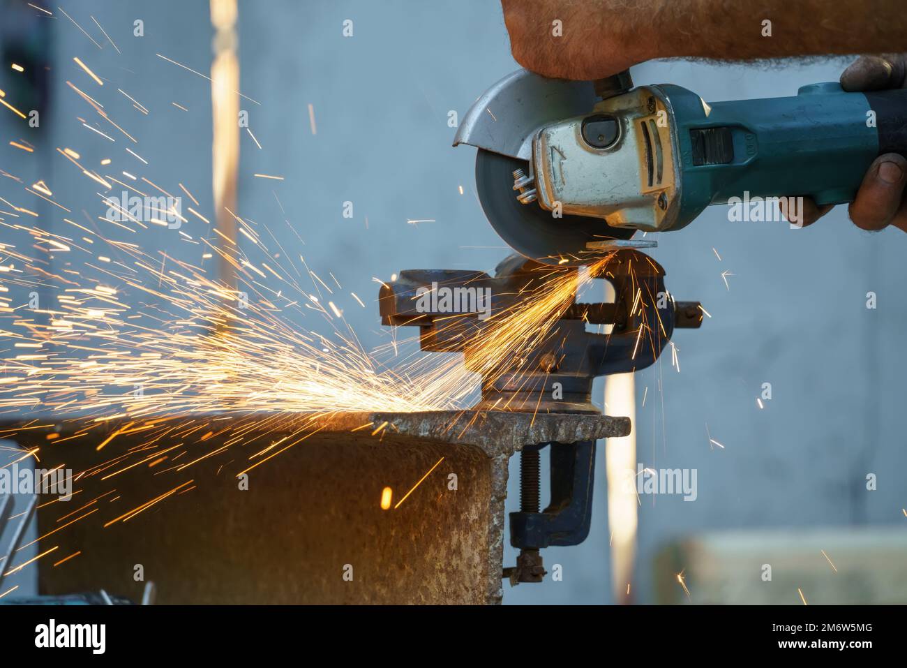 Flex cutting metal with sparks Stock Photo Alamy