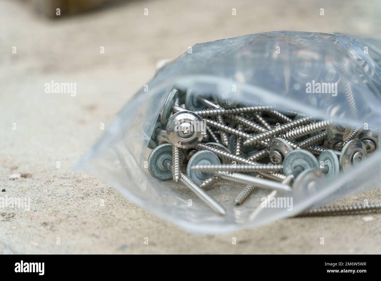 Bag of screws with washers Stock Photo Alamy