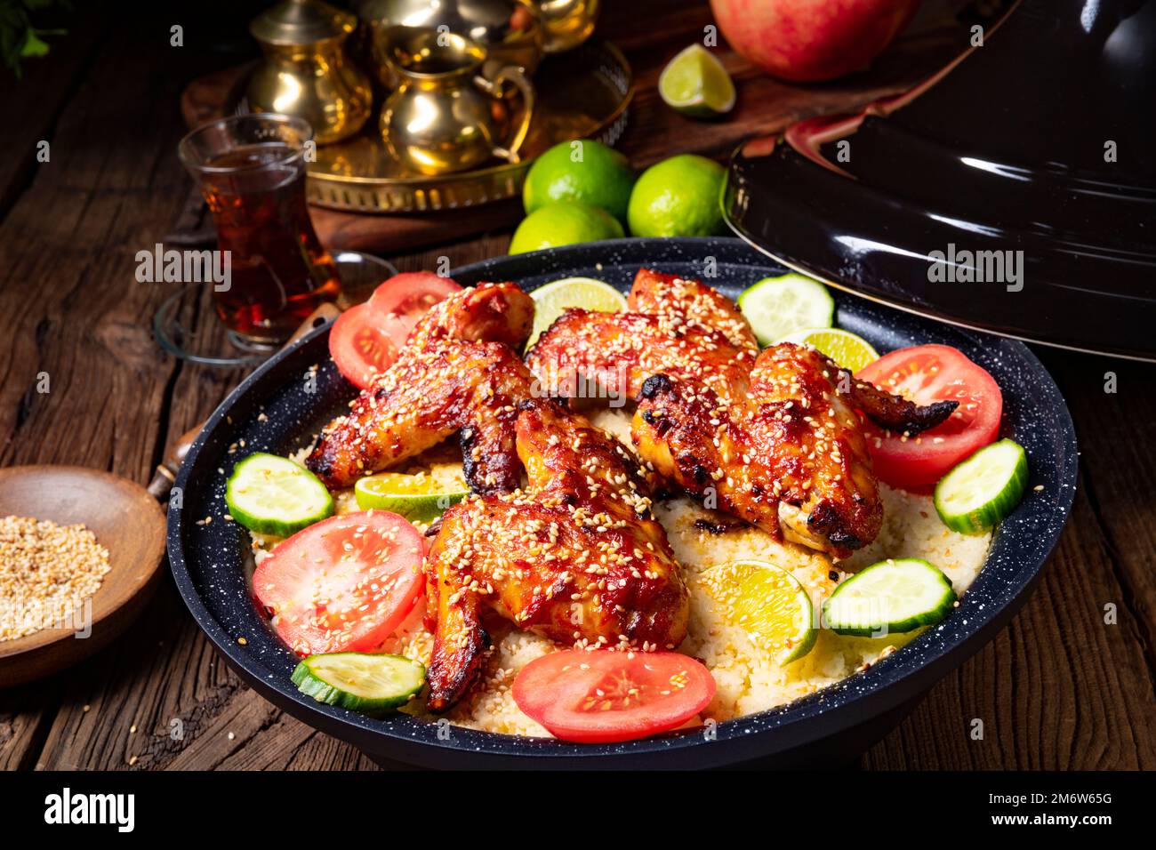 Couscous with fried chicken wings spicy Stock Photo Alamy