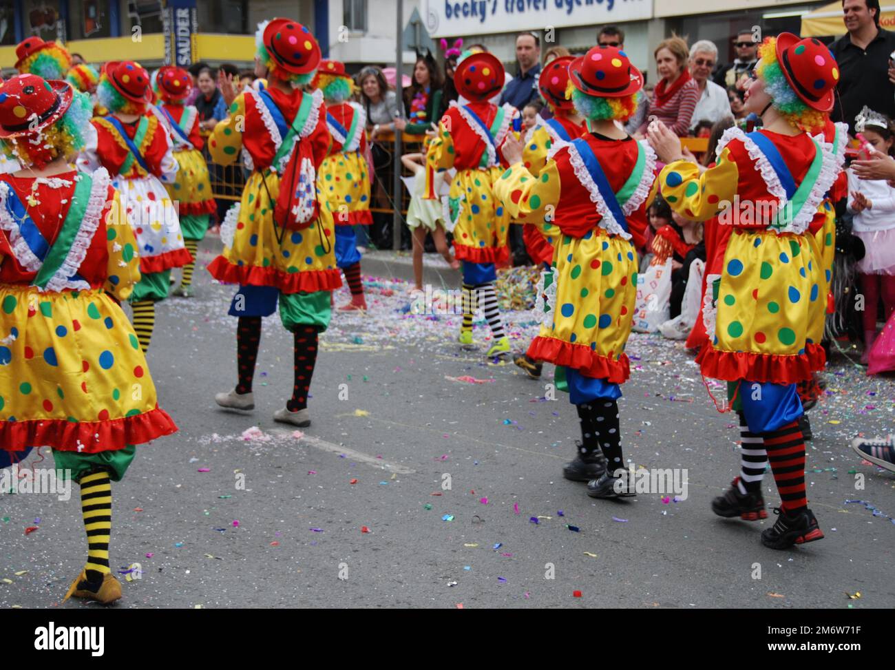 People with colorful costumes parading on carnival parade. Limassol Cyprus Stock Photo