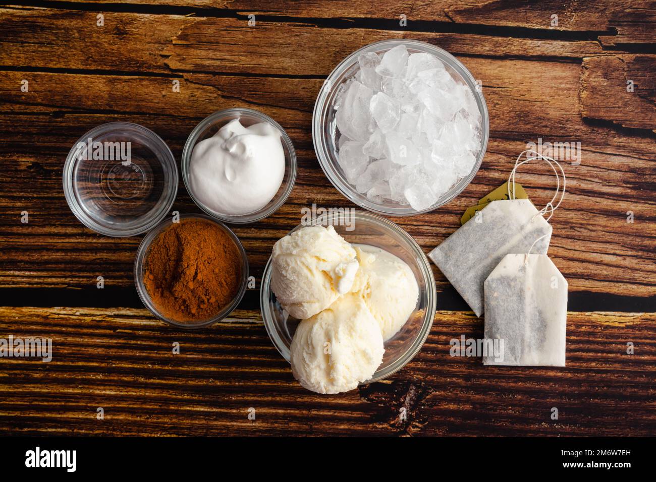 Chai Frappuccino Ingredient Flatlay on a Wood Table Chai tea bags