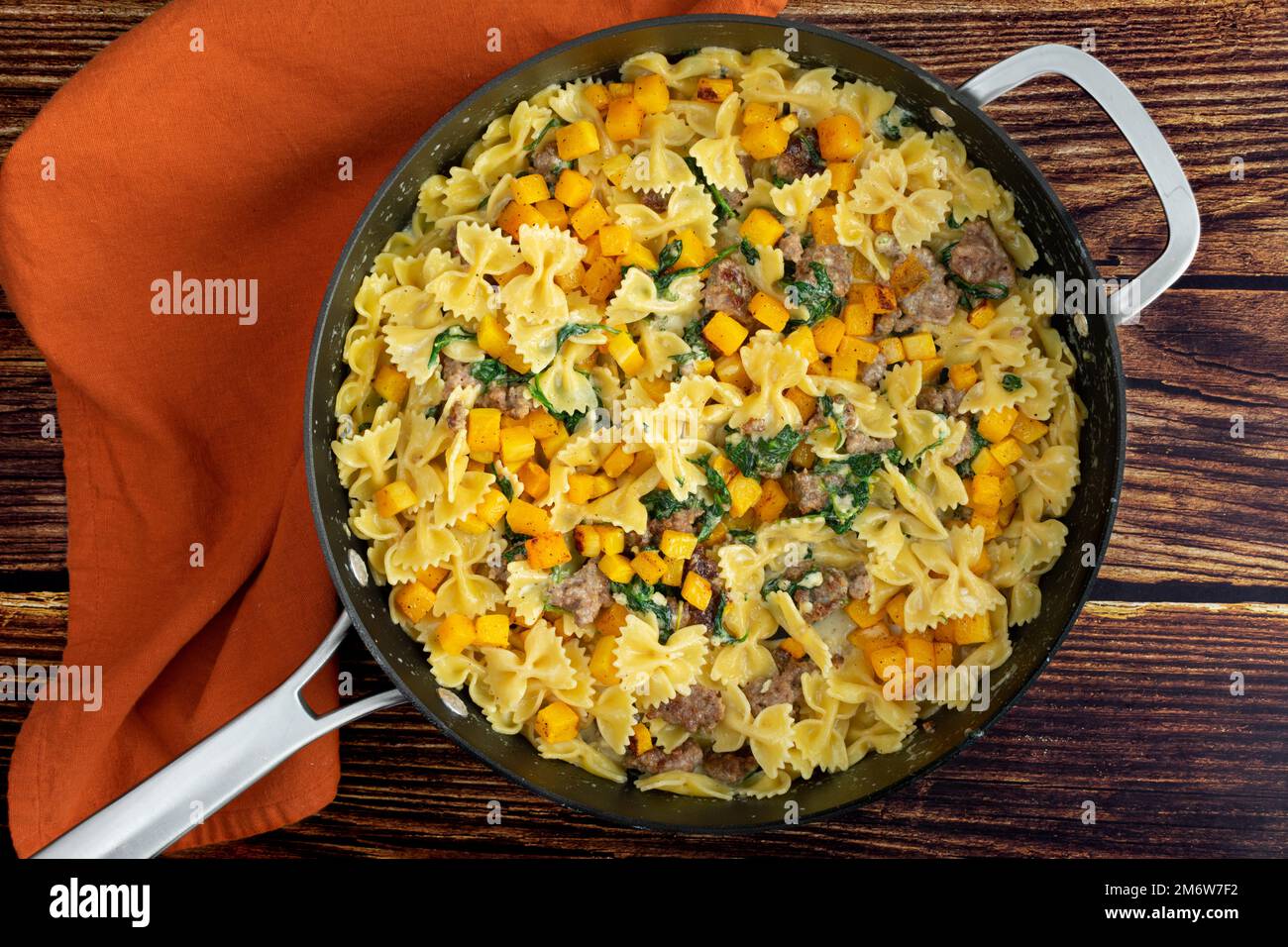 Creamy Roasted Butternut Squash Pasta with Sausage and Spinach in a
