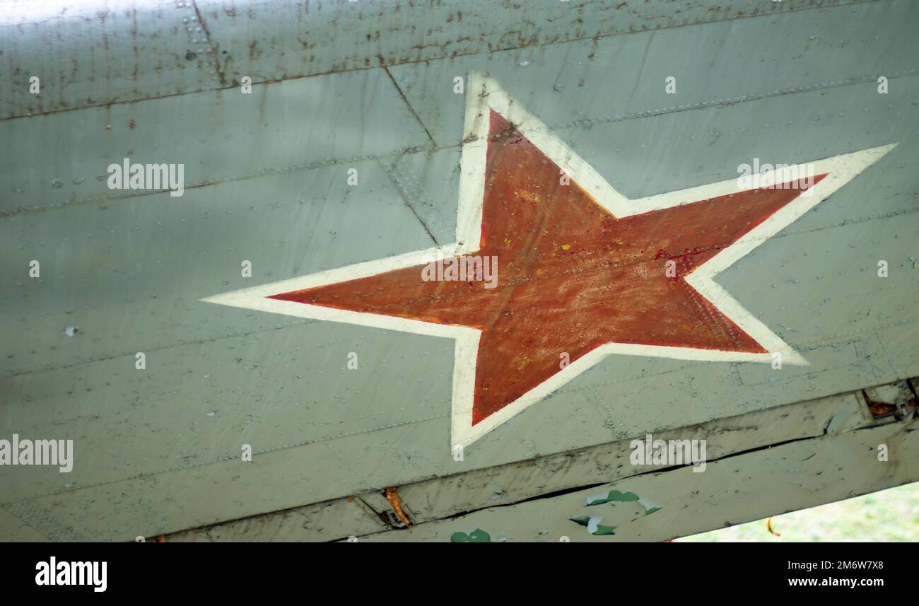 Identification mark of the Air Force of the Russian Federation, a five-pointed red star, bordered by a white stripe on an old So Stock Photo