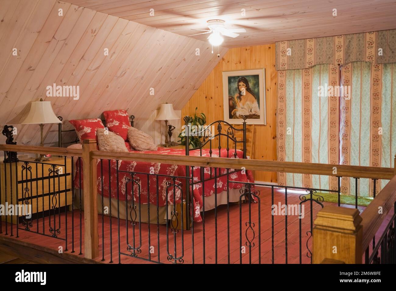 Queen On Railing Queen size four poster bed in master bedroom and wrought iron and wood ...