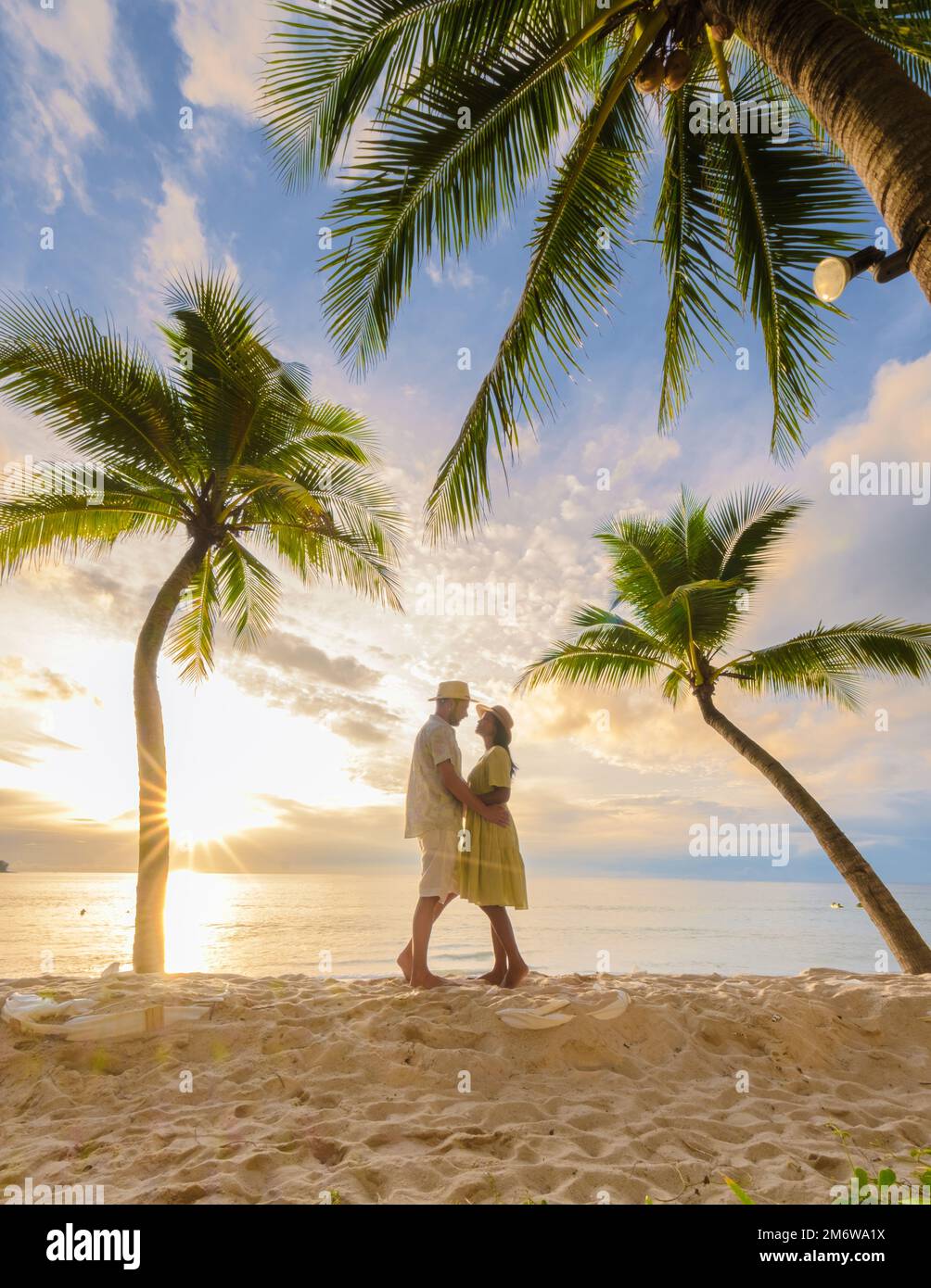 Man watching women on beach hi-res stock photography and images - Alamy