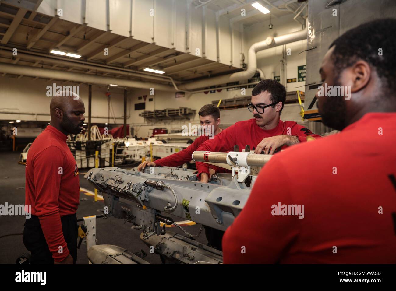 Sailor Make Rack PHILIPPINE SEA (May 6, 2022) Sailors inspect an integrated munitions ...