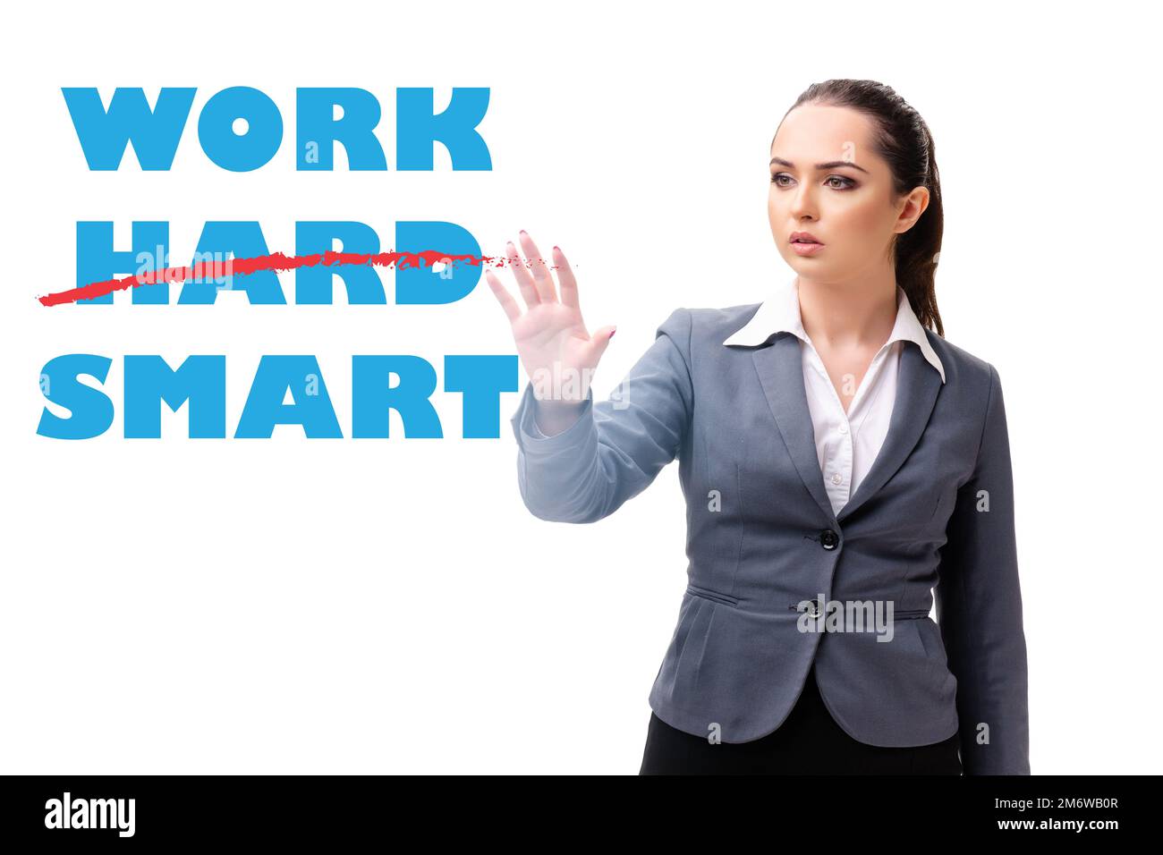 Businesswoman in working smart not hard concept Stock Photo