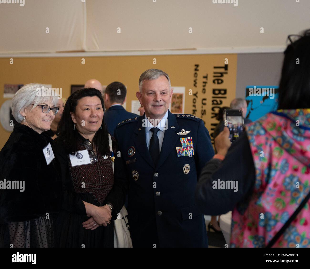 Gen. Glen VanHerck, Commander, North American Aerospace Defense Command and U.S. Northern Command, and Mrs. Marilyn VanHerck pose for a photo with Ms. Mia Yen before the general provided the keynote address highlighting the 75th Anniversary of Alaskan Command, a USNORTHCOM subordinate unified command, at the Alaska Aviation Museum, Anchorage, Alaska, May 6, 2022. (Department of Defense photo by Chuck Marsh) Stock Photo