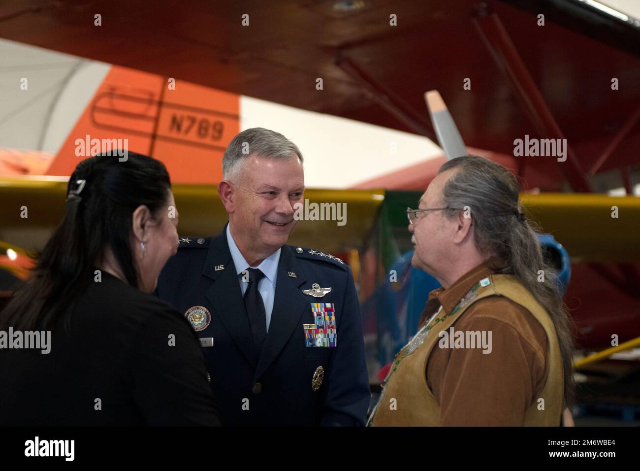 Gen. Glen VanHerck, Commander, North American Aerospace Defense Command and U.S. Northern Command, speaks with “Chief Gary,” Chief of Chickaloon Village, before providing the keynote address highlighting the 75th Anniversary of Alaskan Command, a USNORTHCOM subordinate unified command, at the Alaska Aviation Museum, Anchorage, Alaska, May 6, 2022. (Department of Defense photo by Chuck Marsh) Stock Photo