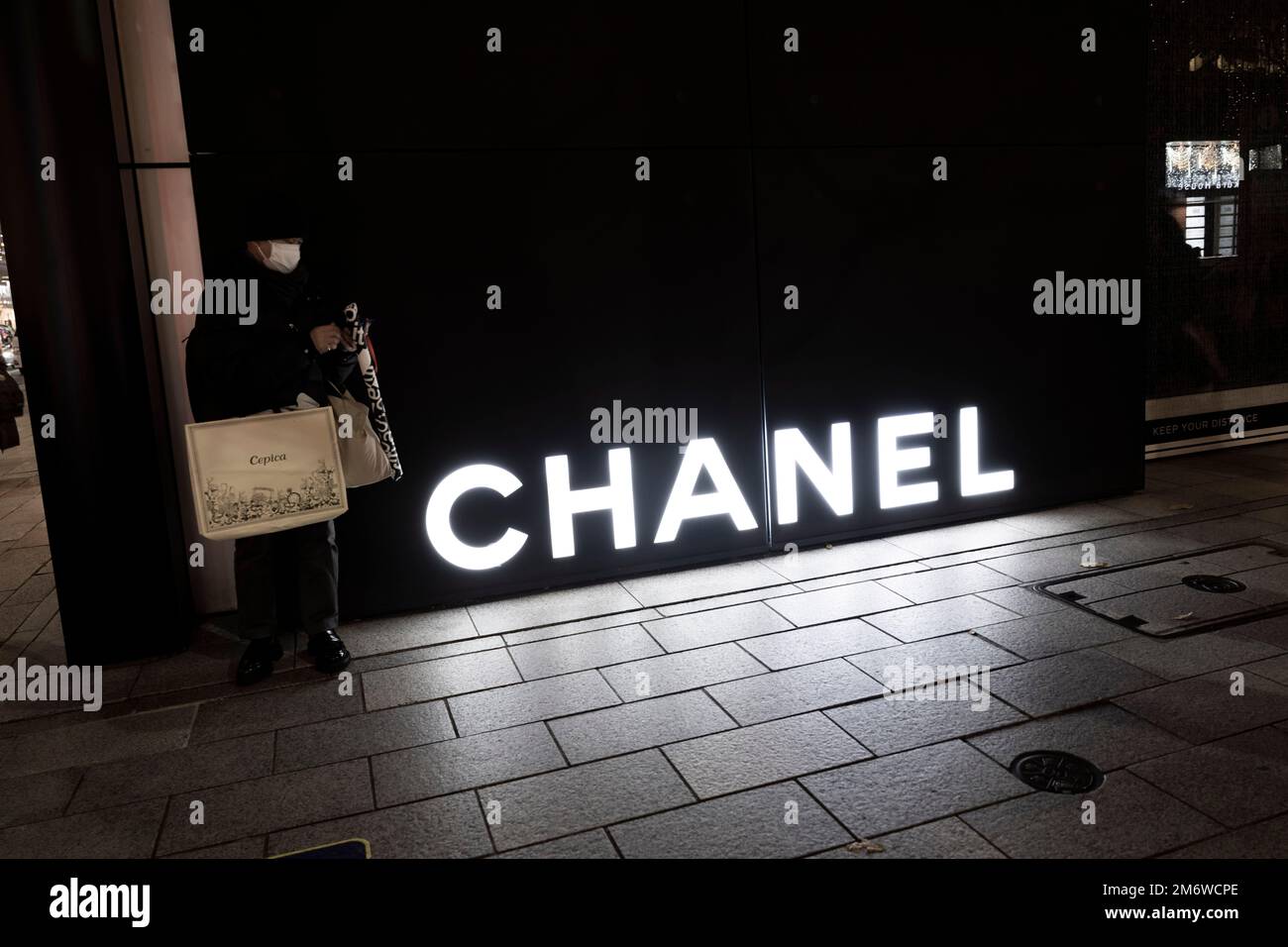 Tokyo, Japan. 3rd Jan, 2023. A Chanel flagship luxury retail location in Ginza. The French fashion house, famous for it's Chanel No. 5 Perfume, was founded in 1910 by Coco Chanel, who was infamous for collaborating with the Nazi occupation of France in the 1940s.Ginza is a popular upscale shopping district known for its Fifth Avenue-like selection of luxury retail stores and wealth. It's adjacent to Chiyoda City, home to the Imperial Palace and the seat of the Japanese Government. (Credit Image: © Taidgh Barron/ZUMA Press Wire) Stock Photo