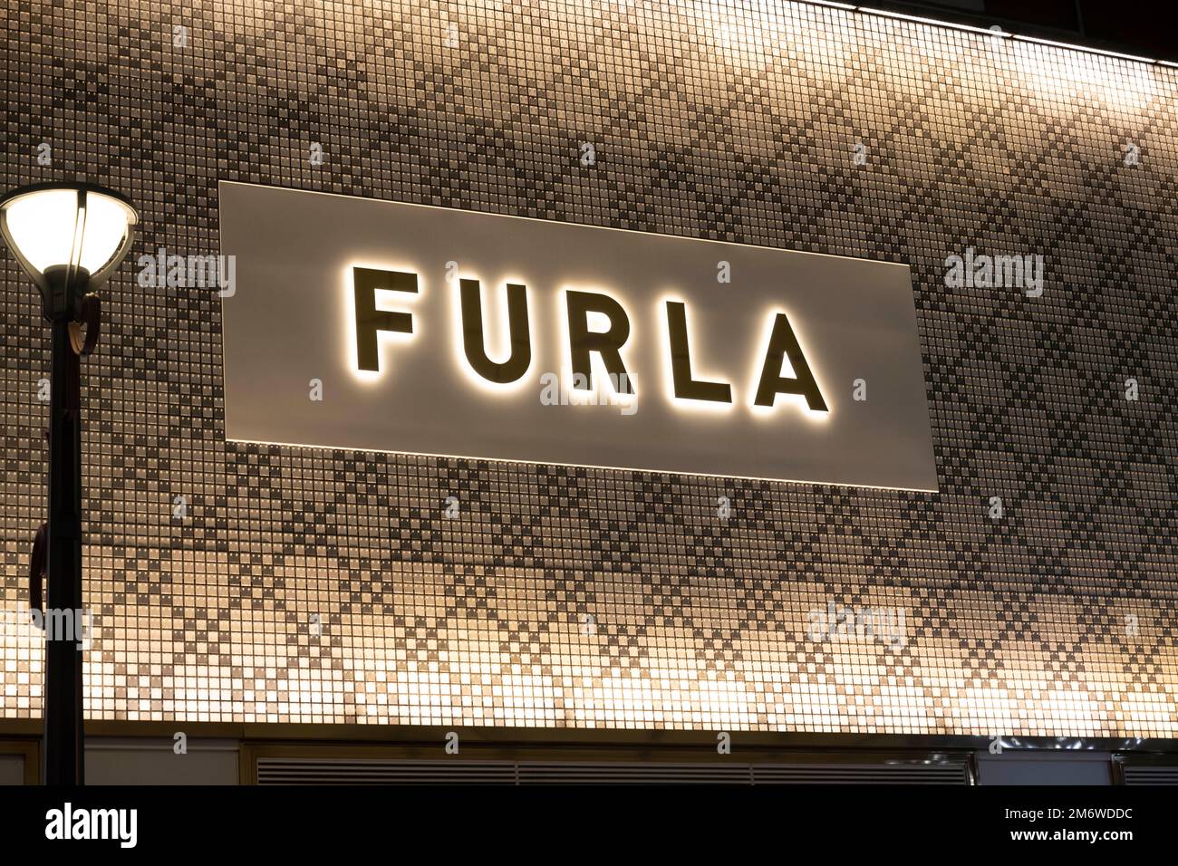 Tokyo, Japan. 3rd Jan, 2023. A Furla flagship luxury retail location in Ginza. The Italian leather goods fashion house is based in Bologna and led by Giovanna Furlanetto, President of Fondazione Furla.Ginza is a popular upscale shopping district known for its Fifth Avenue-like selection of luxury retail stores and wealth. It's adjacent to Chiyoda City, home to the Imperial Palace and the seat of the Japanese Government. (Credit Image: © Taidgh Barron/ZUMA Press Wire) Stock Photo
