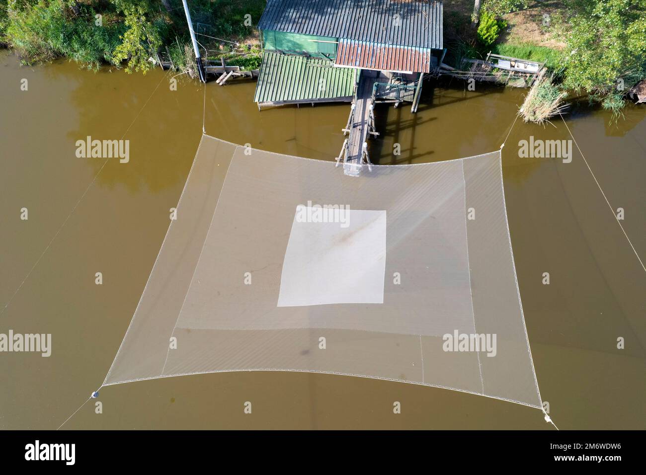 Aerial photograph of old fishing post with net Stock Photo - Alamy