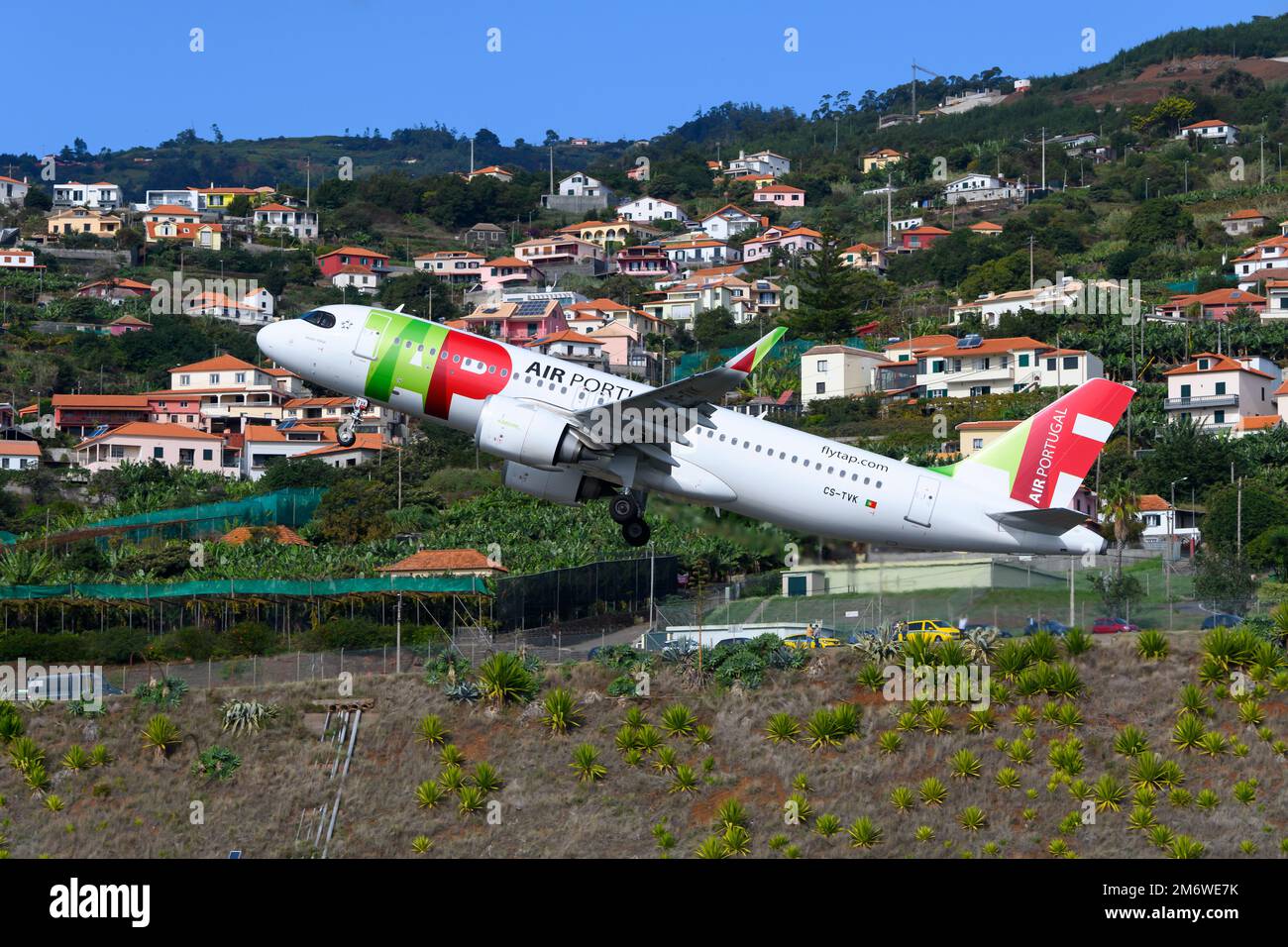 TAP Air Portugal Airbus A320 aircraft taking off from Madeira Airport in Funchal Island.. Airplane A320 of airline TAP Portugal departing. Stock Photo