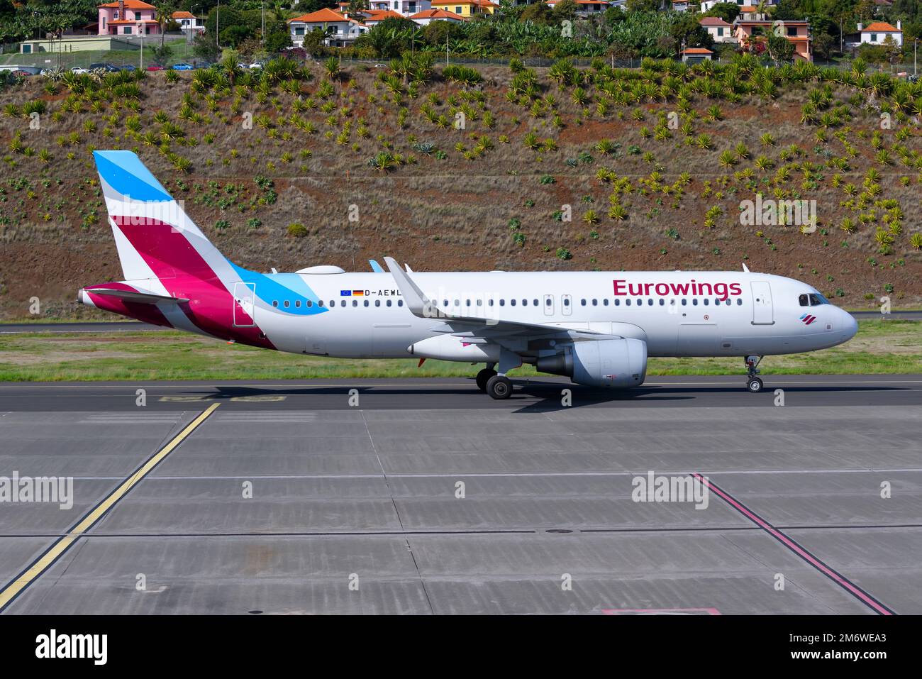 Eurowings Airbus A320 aircraft taxiing. Airplane A320 of EuroWings airline. Plane registered as D-AEWL. Stock Photo