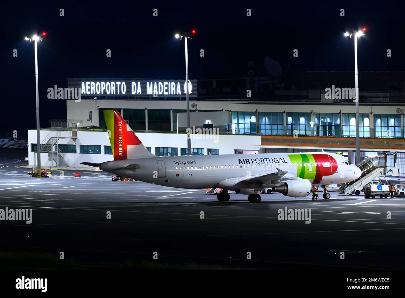 Madeira Airport terminal and TAP Air Portugal aircraft. Airport of Funchal named Cristiano Ronaldo International Airport, also know as Funchal Airport. Stock Photo