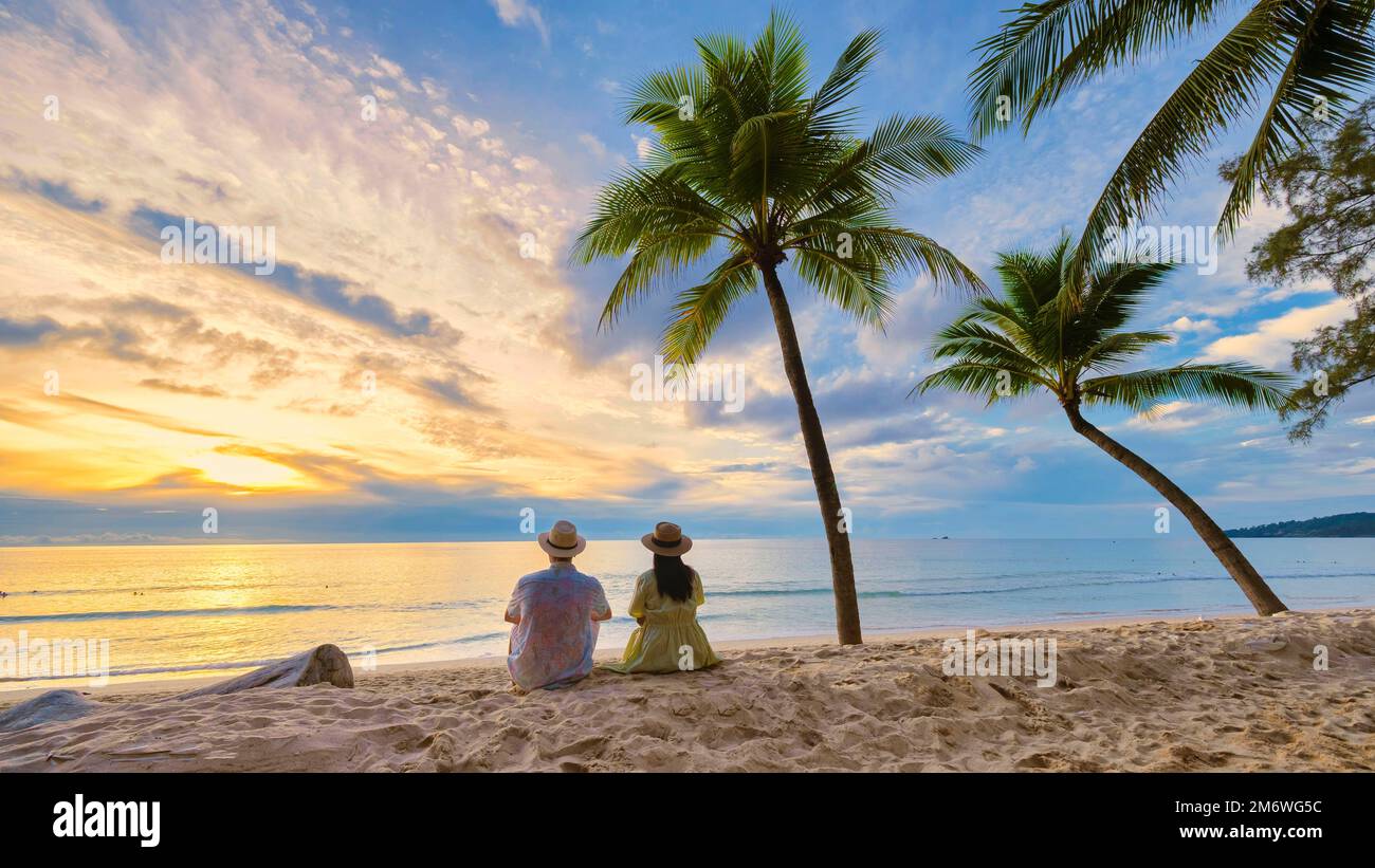 Bang Tao Beach during sunset in Phuket Thailand, palm trees during ...