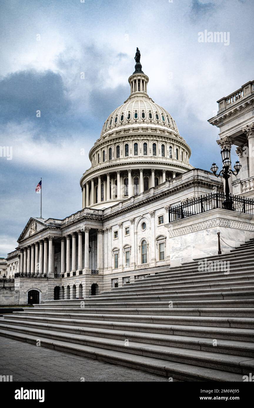 Facade of the United States Capitol building in Washington, D.C. on a cloudy moody day. Stock Photo