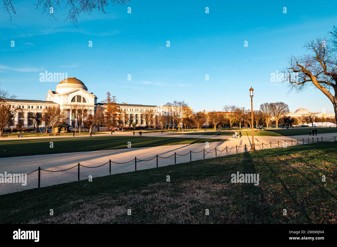 Evening picture, no clouds, blue sky. Panoramic view of The National Mall in Washington, D.C. A vast green space that stretches for over two miles. Stock Photo