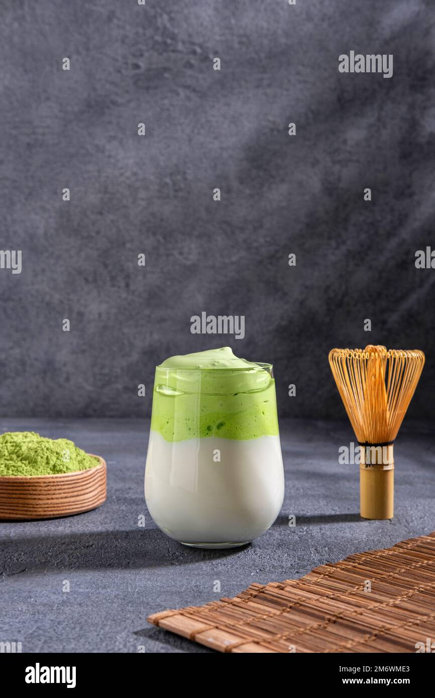 Matcha tea. Iced green tea matcha latte in glass. Green tea dalgona