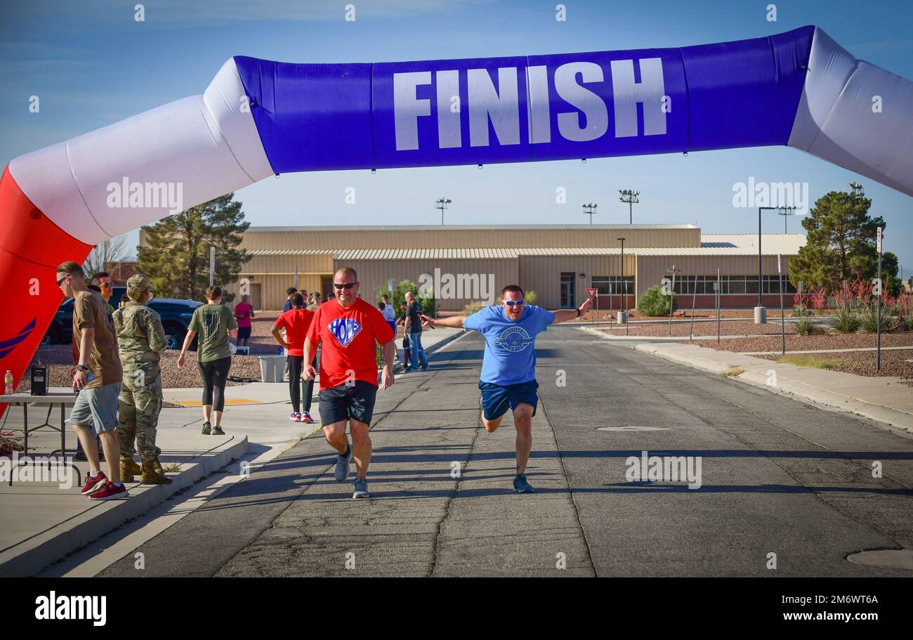 Members of tghe 926th Wing finish a morale 5K in observance of Mental Health Awareness Month, May 7, 2022, at Nellis Air Force Base, Nev. Stock Photo