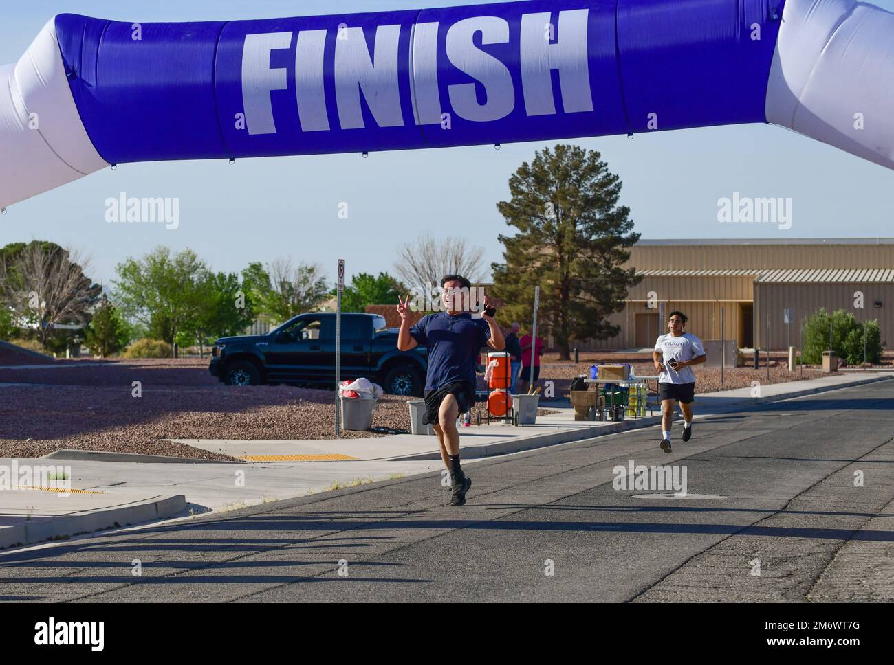Runners from the 926th Wing finish a 5K in recognition of Mental Health Awareness Month May 7, 2022, at Nellis Air Force Base, Nev. Stock Photo
