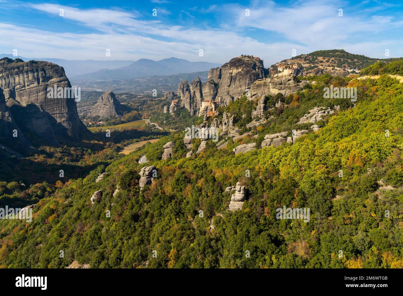 A landscape of the Meteora rock formations with the famous monasteries on the hilltops Stock Photo