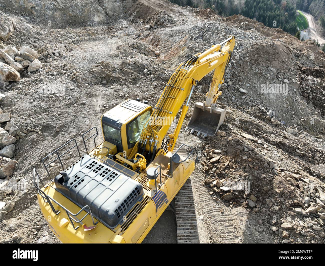 Industrial mine excavators are digging the soil in the construction