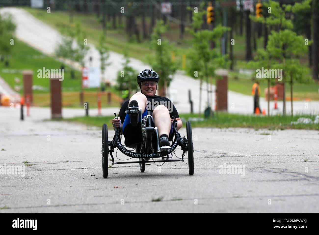 U.S. Army Sgt. 1st Class Samantha Marcy rides a recumbent bike in the