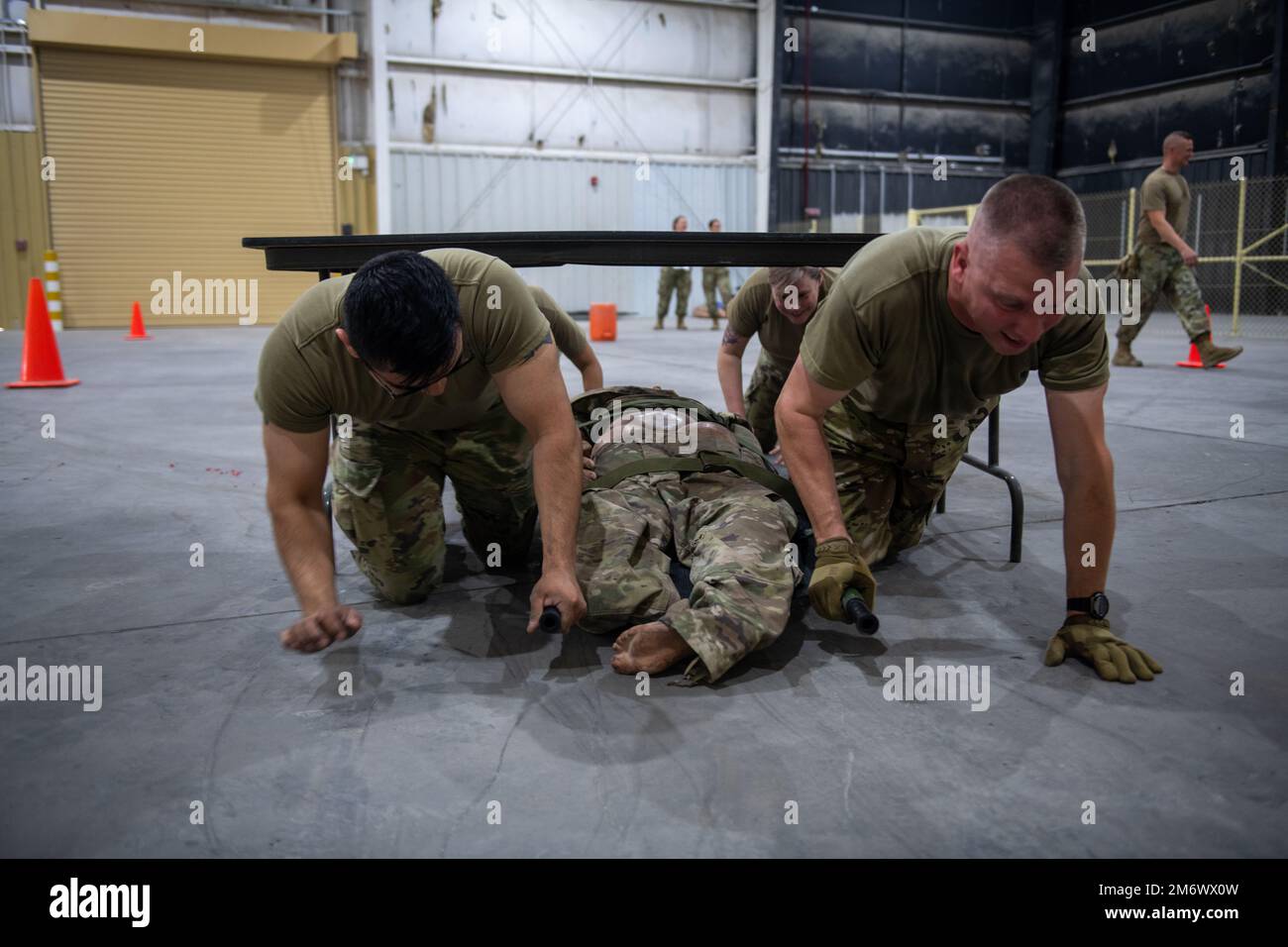 Airmen with the 379th Expeditionary Medical Group pull a loaded ...