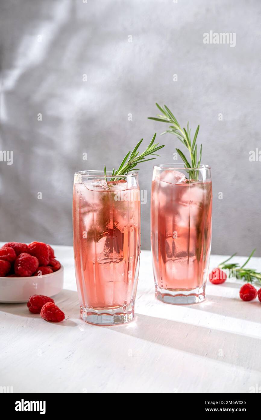 Summer refreshing nonalcoholic cocktails. Raspberry lemonade garnished