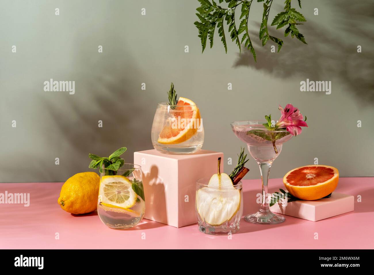 Hard seltzer cocktails with various fruits pear, grapefruit, lemon