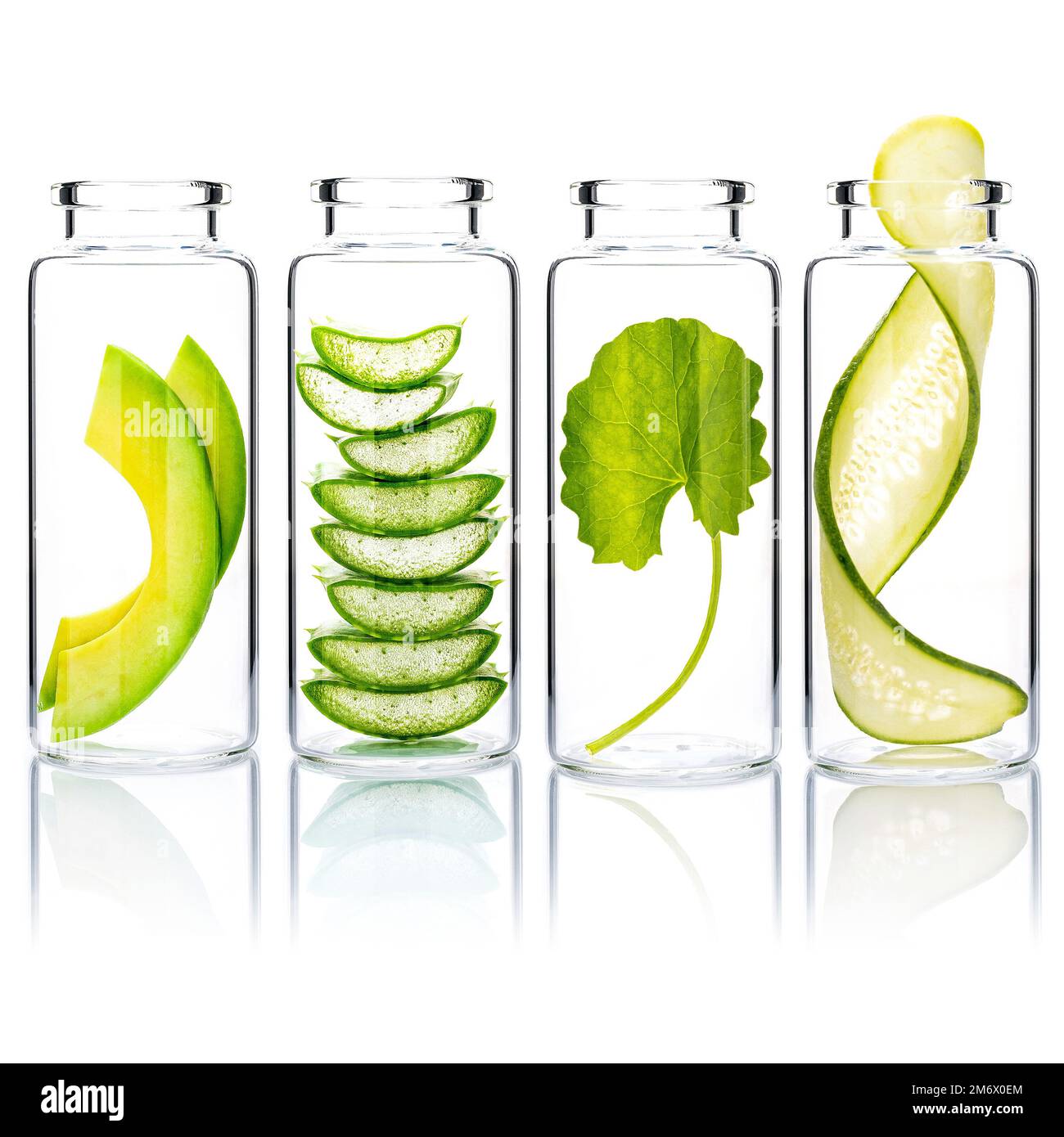 Homemade skin care with natural ingredients avocado ,aloe vera ,centella  asiatica and mint leaves in glass bottles isolate on white background Stock  Photo - Alamy