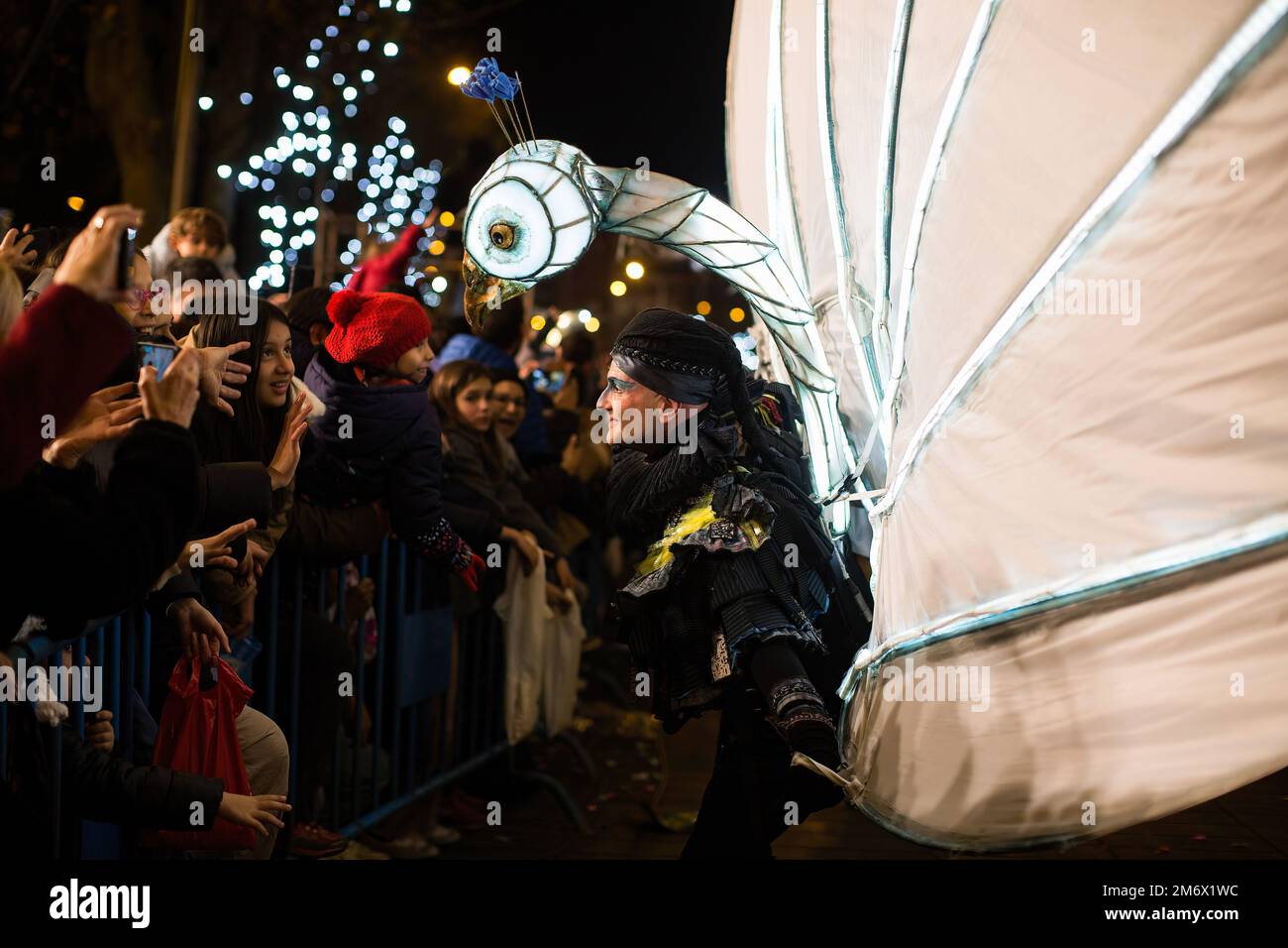 Madrid, Spain. 05th Jan, 2023. An actor in a bird costume greets the public during the traditional Three Kings Parade in Madrid. This year the Three Kings Parade returned to normal with floats and candy for the public after the pandemic. (Photo by Luis Soto/SOPA Images/Sipa USA) Credit: Sipa USA/Alamy Live News Stock Photo