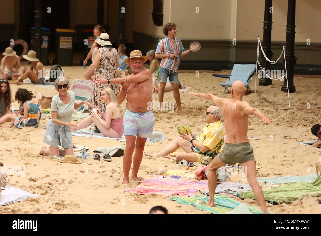 Sydney, Australia. 6th January 2023. Making its Australian premiere on Friday 6 January, the award-winning Sun & Sea will be staged in Sydney Town Hall and transformed to become a beachscape, complete with sand, sunbathers and holidaymakers. A sellout at the 2019 Venice Biennale where it was awarded the Golden Lion, Sun & Sea is a durational English-language opera work in-the-round that confronts themes of climate emergency with humour and power. Credit: Richard Milnes/Alamy Live News Stock Photo
