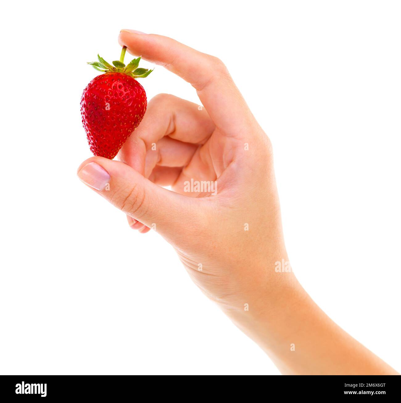 Healthy red goodness. Cropped studio shot of a woman holding a ...