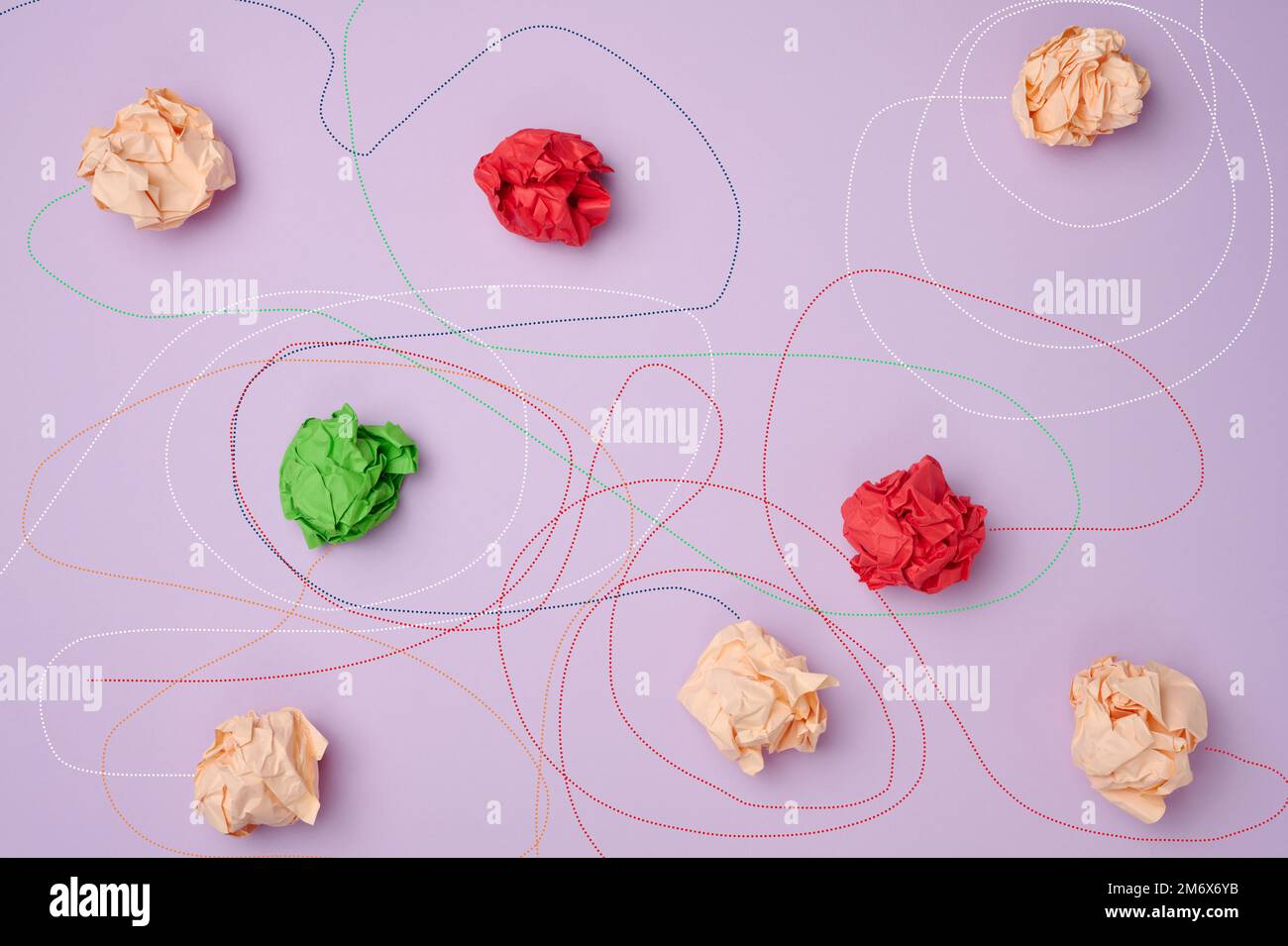 Crumpled paper balls and different paths. Concept of a strong leader ...