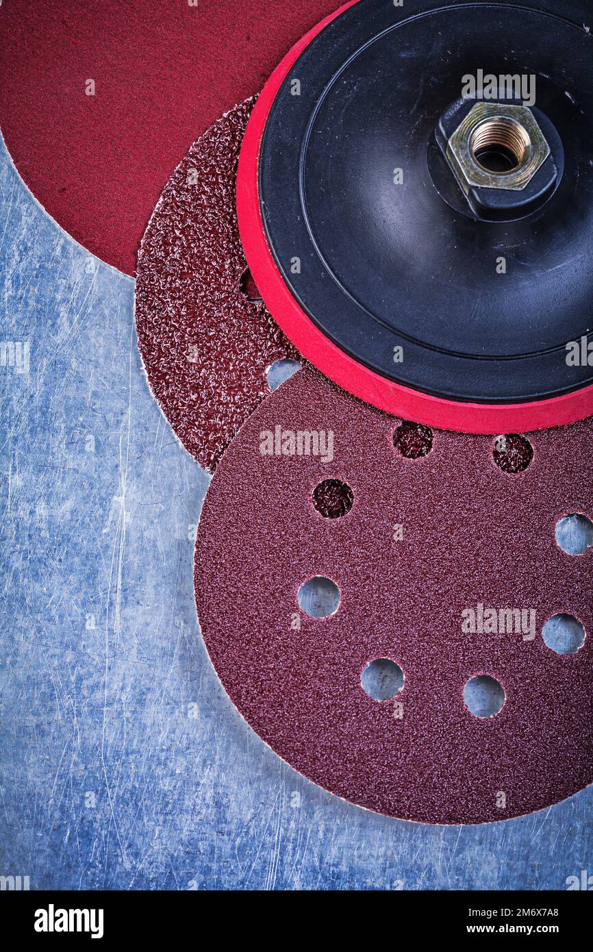 Abrasive wheels holder on metallic background top view Stock Photo - Alamy