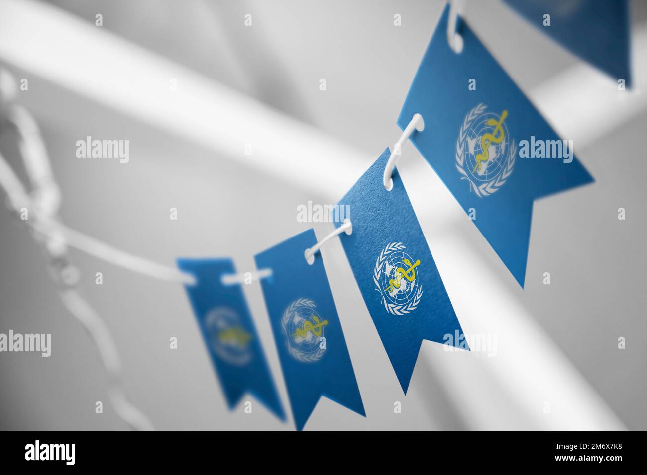 A garland of World Health Organization WHO national flags on an ...