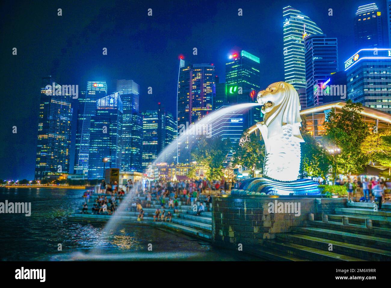 Merlion and Singapore town Stock Photo - Alamy