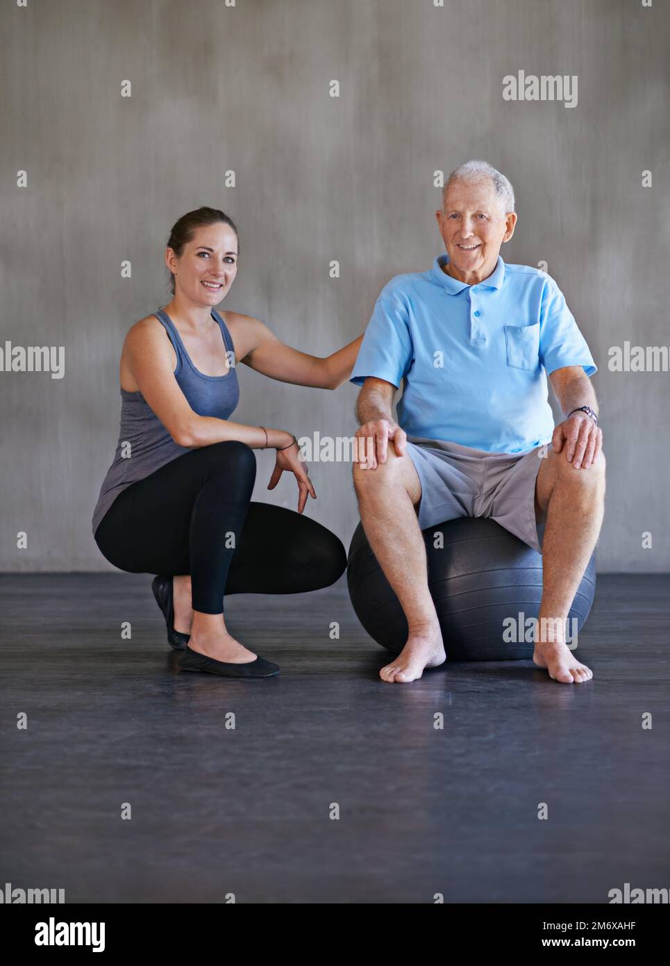 Helping him get back to his old self. a a physical therapist working with a senior man. Stock Photo