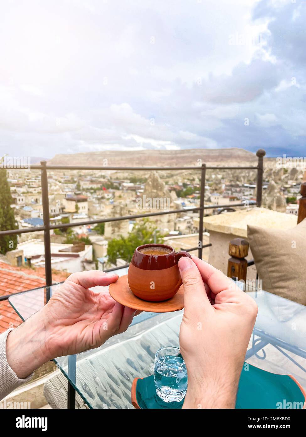 Cup with traditional Turkish coffee on a background of a valley in