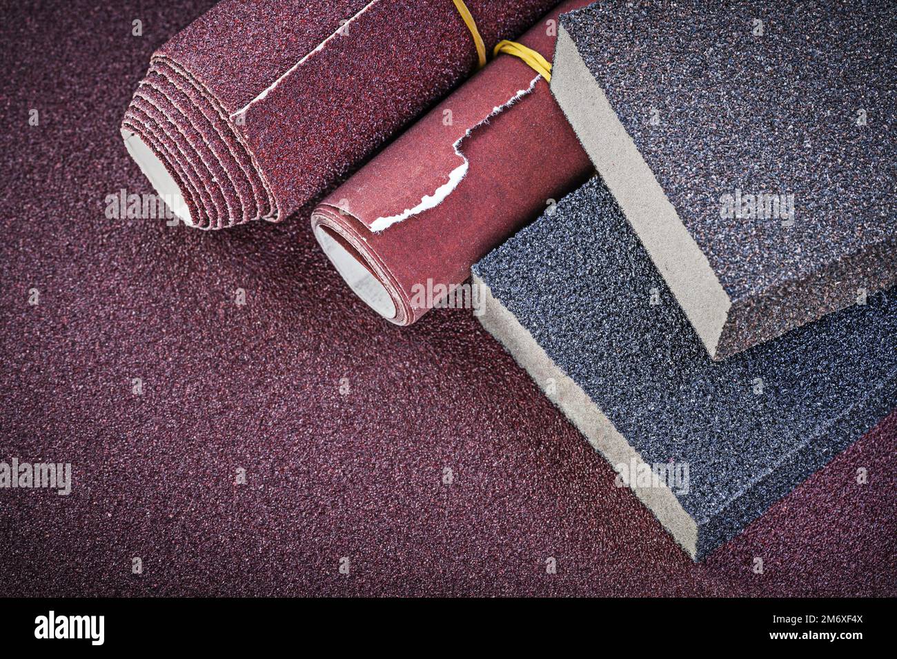 Glasspaper rolls sanding sponges on polishing sheet abrasive materials