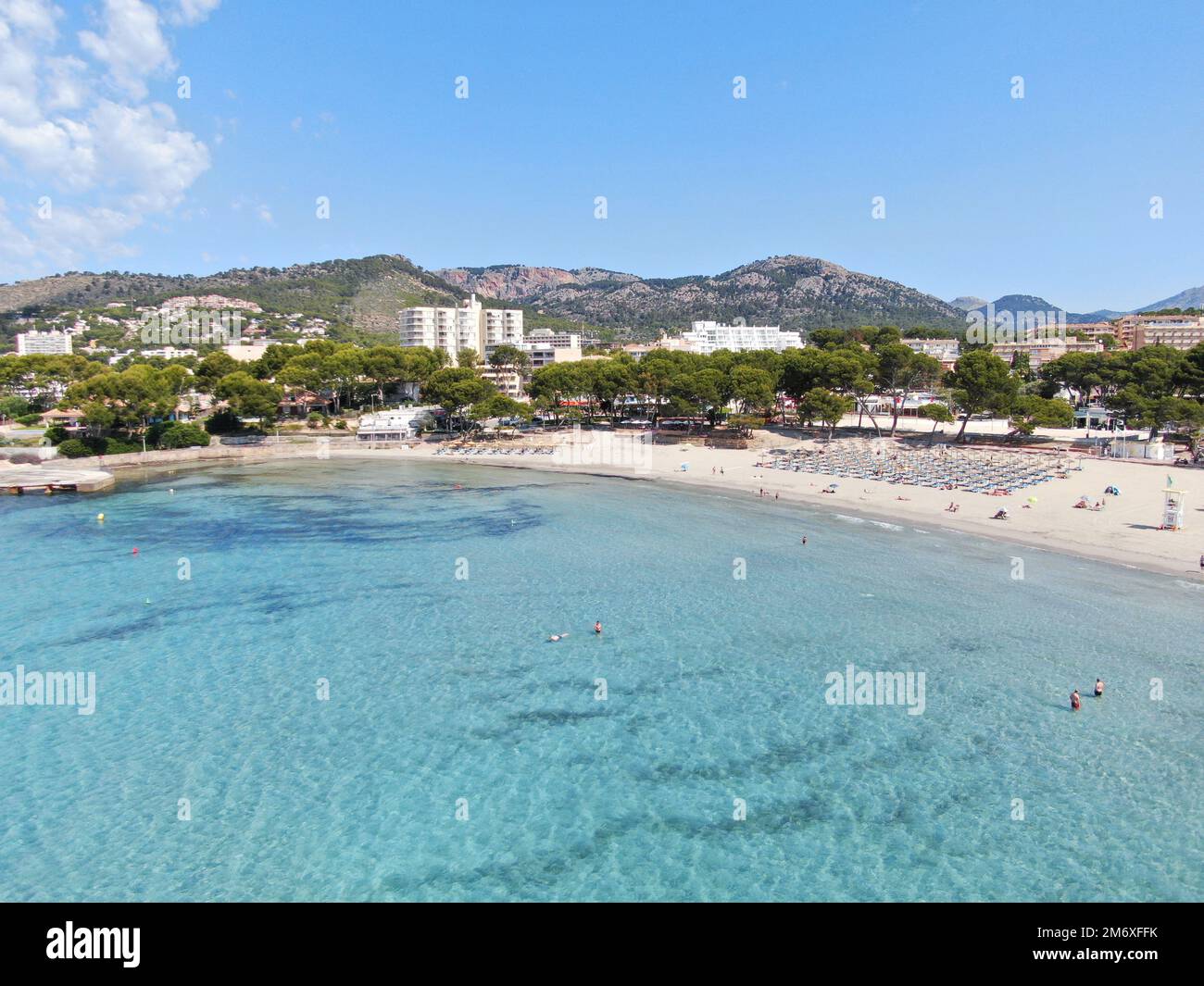 Paguera beach in Majorca. Beautiful View of the coast of Majorca with blue waters, white sand, hotels and moutains. Holidays, resort, summer and vacat Stock Photo