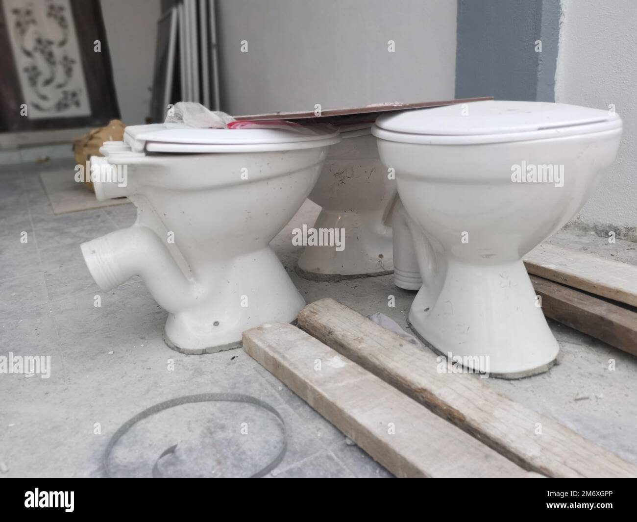 white ceramic toilet seat with slid Stock Photo Alamy