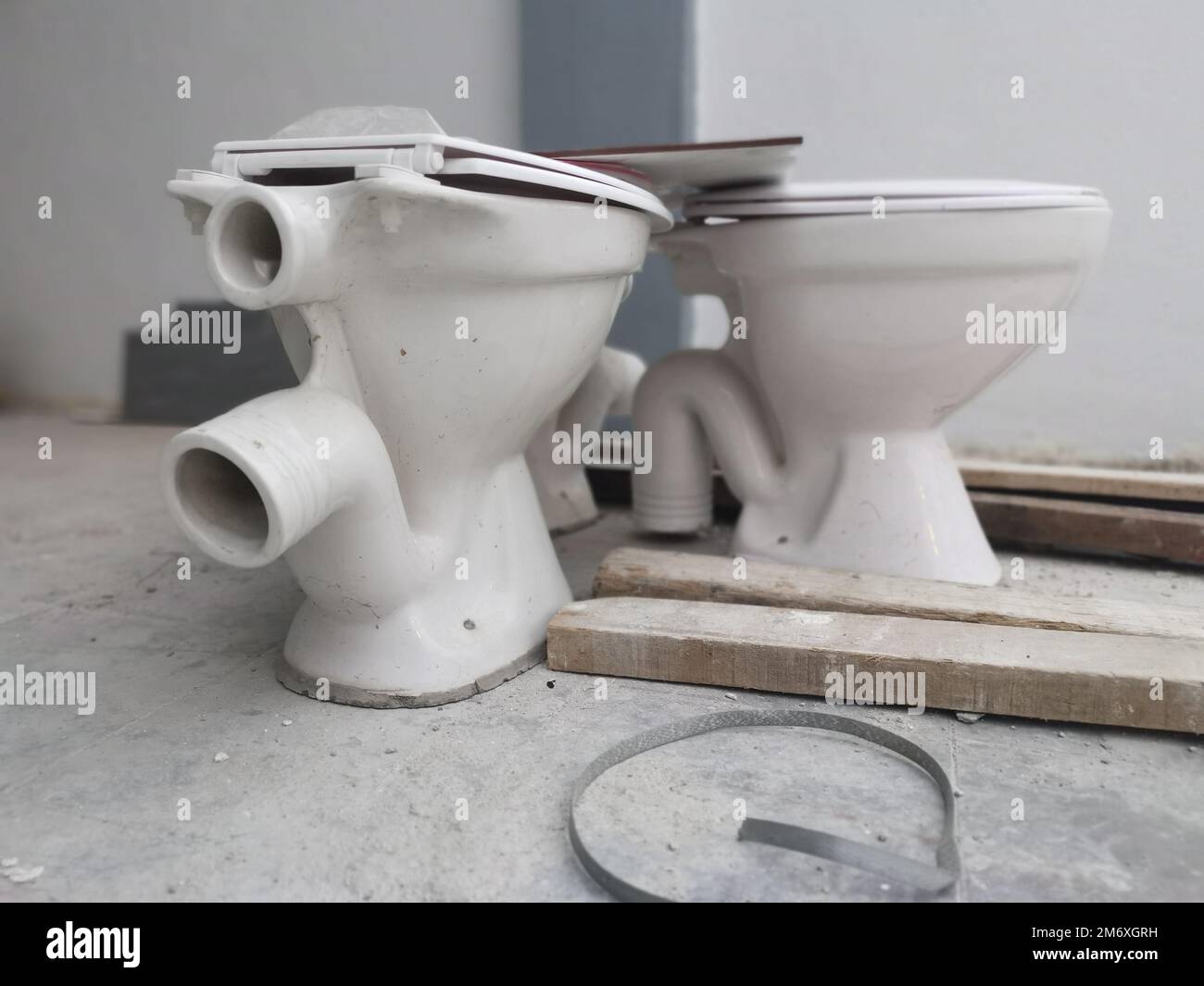 white ceramic toilet seat with slid. Stock Photo