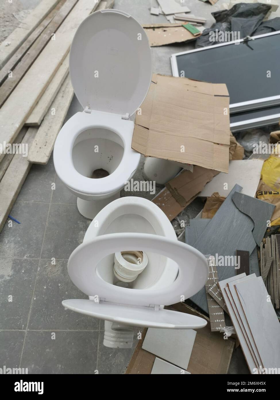 white ceramic toilet seat with slid Stock Photo Alamy