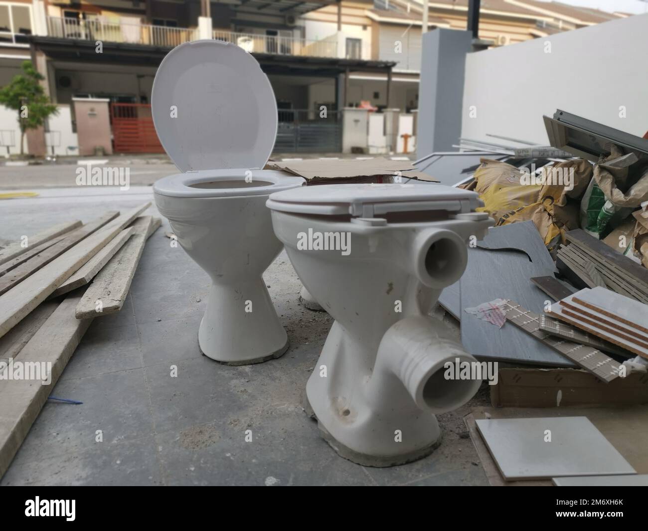 white ceramic toilet seat with slid Stock Photo Alamy