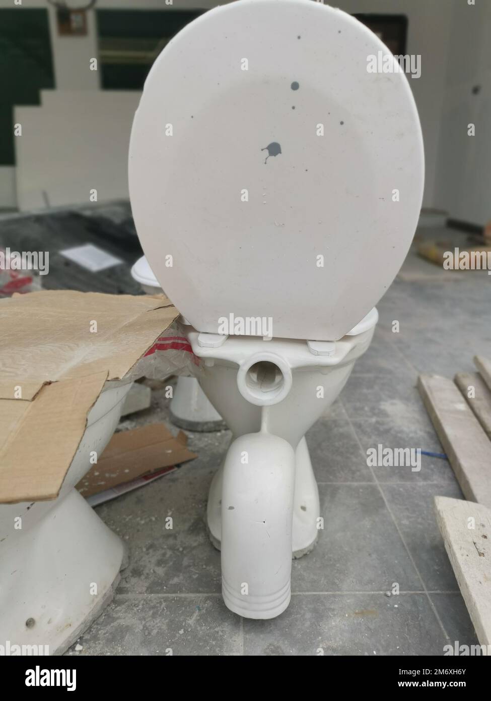 white ceramic toilet seat with slid Stock Photo Alamy